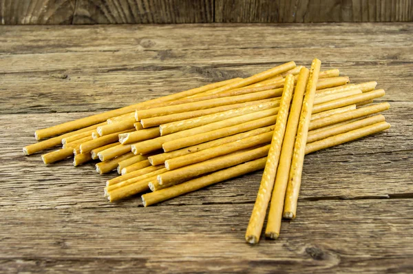 Bread sticks on wooden background — Stock Photo, Image