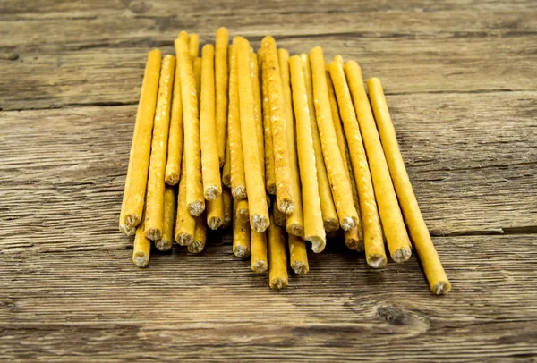 Bread sticks on wooden background — Stock Photo, Image