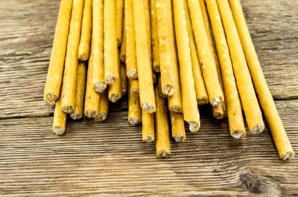 Palitos de pan sobre fondo de madera —  Fotos de Stock