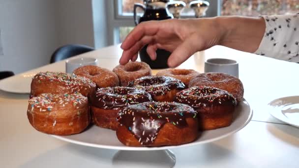 Hand Grabs Fresh Homemade Donut Plate — Stock Video