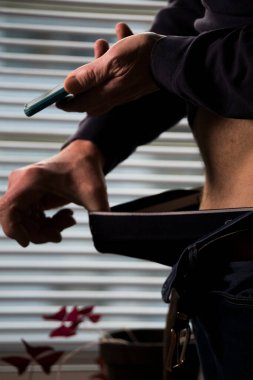 A man takes a dick pic of himself