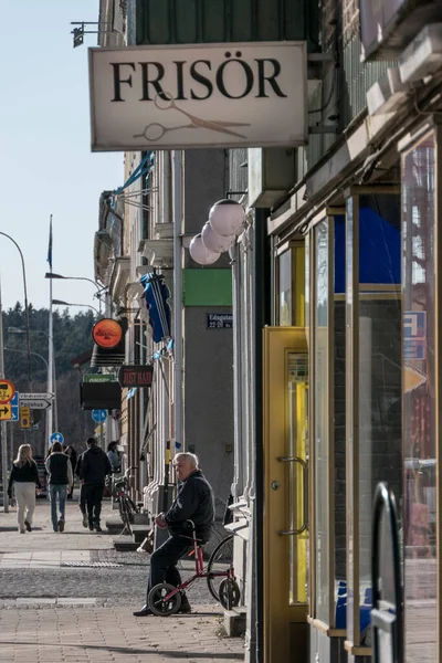 Vanersborg Sweden Senior Man Sits Corner Street Sign Barber Frisor — стокове фото