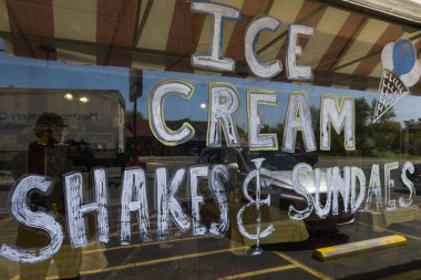 La Plata, Maryland, USA A local diner and a sign for Ice cream, shakes and sundaes.