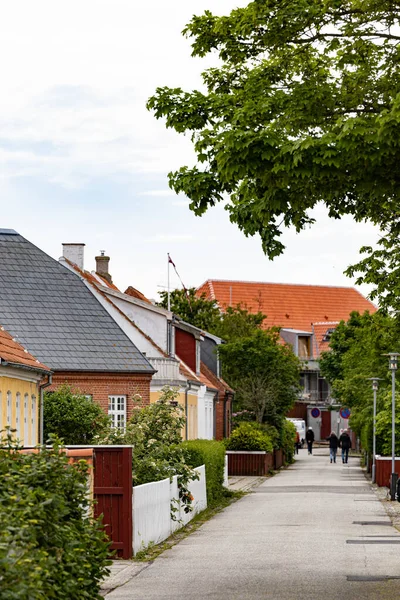 Skagen, Denmark The cute back streets of the village with yellow and red houses.
