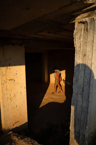 Ksamil Albania Man Shorts Walks Old Garage Strong Sunlight — Foto Stock