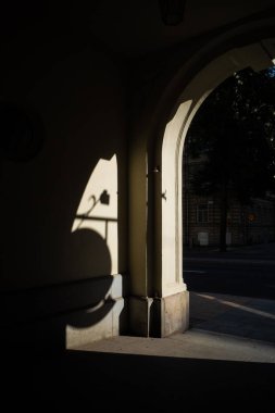 Stockholm, Sweden An arched portico and shadow of street lamp on Fleminggatan on Kungsholmen.