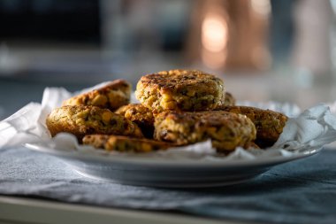 A pile of freshly fired lentil burgers.
