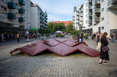 Stockholm, Sweden  A wavy bench at Liljeholmen on liljeholmstorget.
