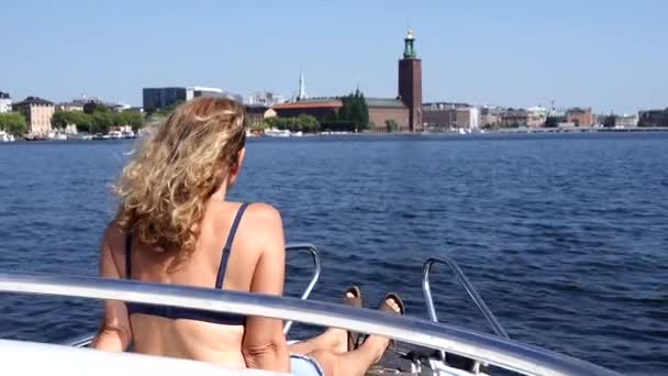 Stockholm Sweden Woman Rides Motorboat Sun City Hall Background — Stock video