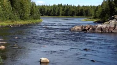 Sorsele, Sweden A small river in the wilderness of northern Sweden and small rapids. 