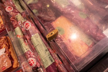Copenhagen, Denmark,  Expensive cuts of meat are kept under lock and key in supermarkets due to high and rising prices of meat to avoid theft.