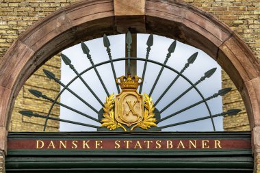 Copenhagen, Denmark, An old sign and entrance to the Danske Statsbaner, or Danish railroad authority.