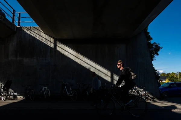 Copenhagen Denmark Male Bicyclist Metro Underpass Outdoors Beam Sunlight Orestad — Stock Photo, Image