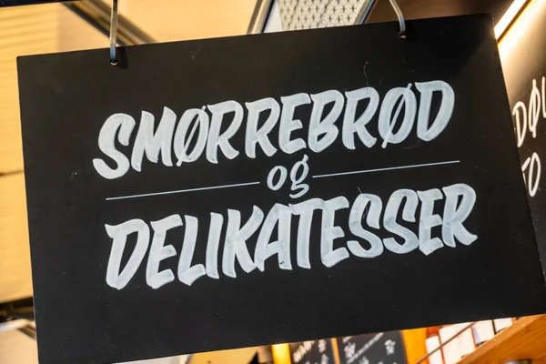 Copenhagen, Denmark  A sign in a shopping mall for Smorrebrod and delicatessen.