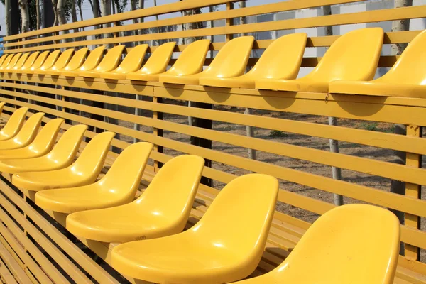 Empty colorful stadium seats — Stock Photo, Image