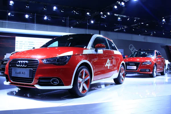 Red Audi A1 sedan on display in a car sales shop, Tangshan, Chin — Stock Photo, Image