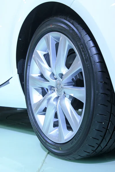 Car wheels in a car sales shop — Stock Photo, Image