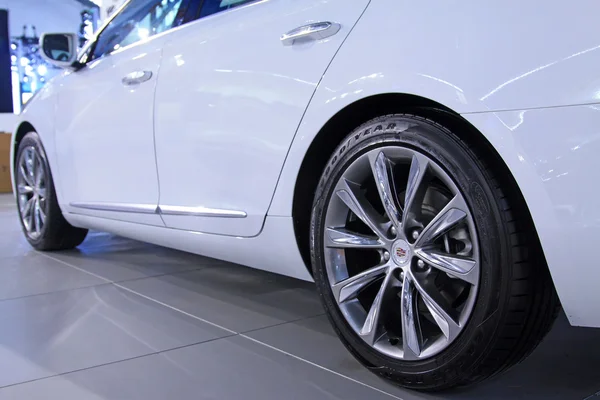 Car wheels in a car sales shop — Stock Photo, Image