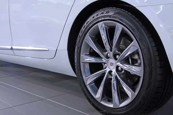 Car wheels in a car sales shop — Stock Photo, Image