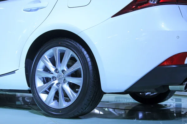 Car wheels in a car sales shop — Stock Photo, Image