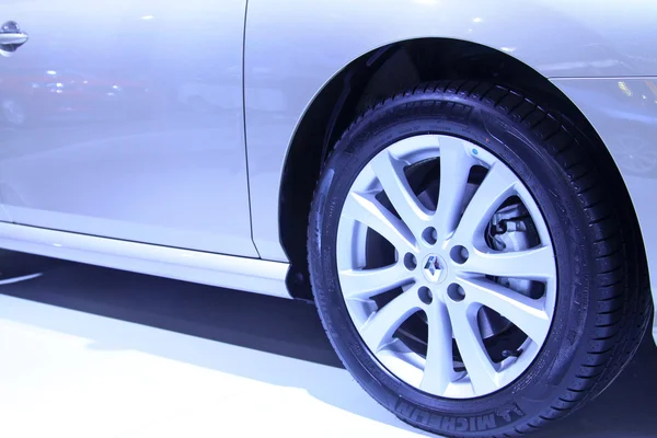 Car wheels in a car sales shop — Stock Photo, Image