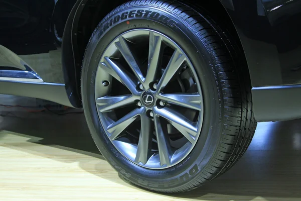 Car wheels in a car sales shop — Stock Photo, Image