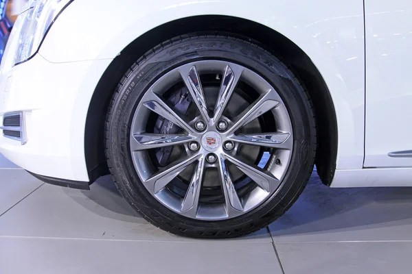 Car wheels in a car sales shop — Stock Photo, Image