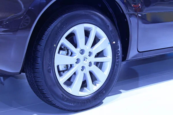 Car wheels in a car sales shop — Stock Photo, Image