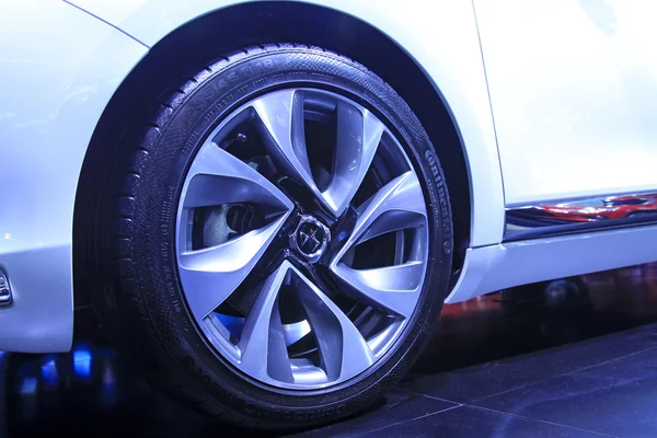 Car wheels in a car sales shop — Stock Photo, Image