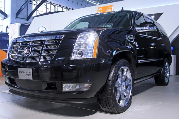 Cadillac Escalade car on display in a car sales shop, Tangshan, — Stock Photo, Image