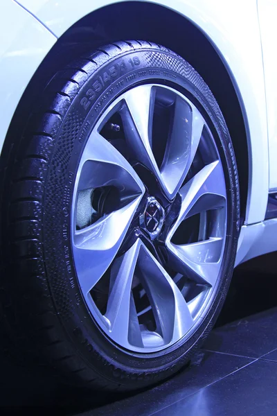 Car wheels in a car sales shop — Stock Photo, Image