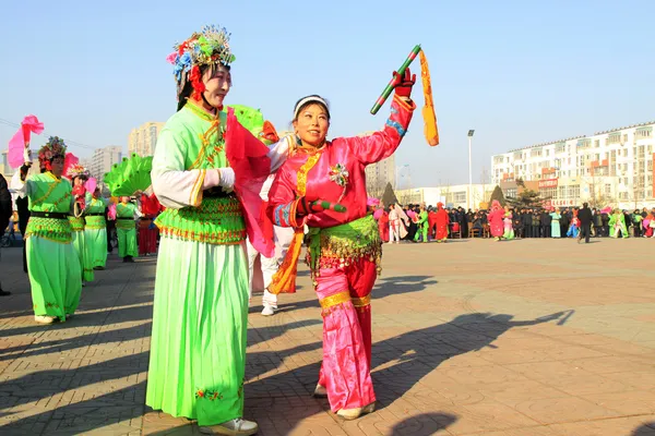 people wear colorful clothes, yangko dance performances in the s