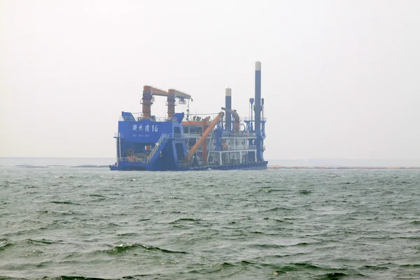 Suction sand shipping in the sea — Stock Photo, Image