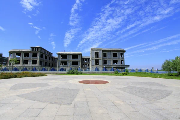 Unfinished buildings in a park — Stock Photo, Image