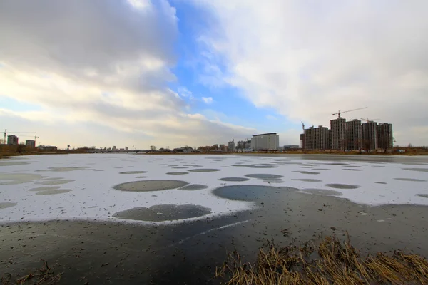 Circular pattern on the ice, in the river, winter — Stock Photo, Image