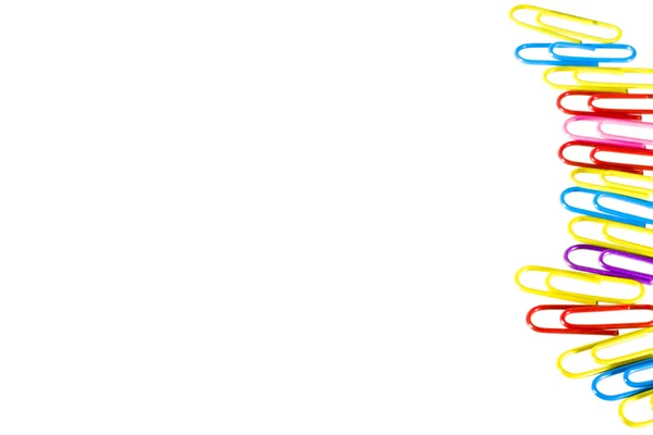 Яркие разноцветные клипы на белом фоне Лицензионные Стоковые Изображения
