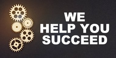 İş ve endüstri kavramı. Siyah bir arkaplanda, dişliler ve yazıtlarda...