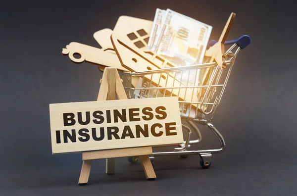 Business Finance Concept Black Background Shopping Cart Purchases Next Easel — Stock Photo, Image