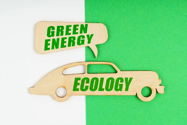 Környezetvédelmi Koncepció Fehér Zöld Háttér Egy Figura Egy Autó Felirattal — Stock Fotó