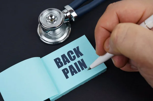 Medicine Health Concept Black Table Stethoscope Notebook Which Man Wrote — Stock Photo, Image