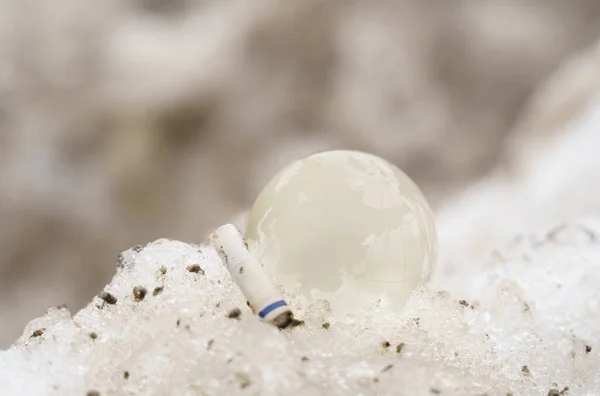 Glass Ball Lies Dirty Snowdrift Next Cigarette Butt Concept Harm — Fotografia de Stock