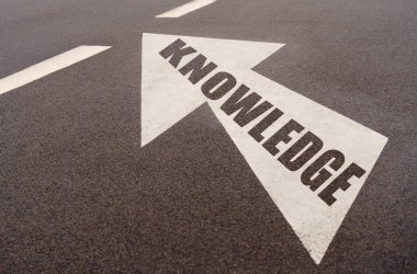 Markings and an arrow with the inscription - KNOWLEDGE