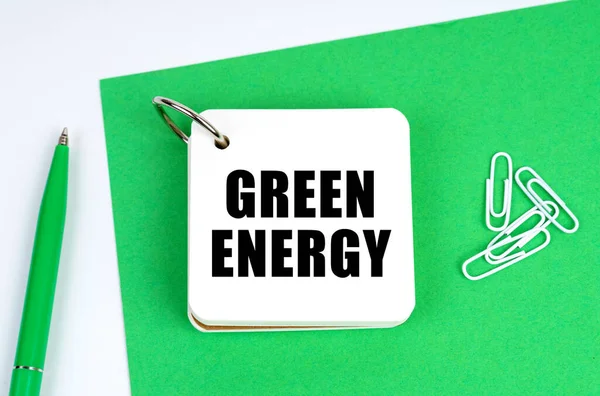 Ecology Industry Concept White Surface Lies Green Sheet Paper Pen — Zdjęcie stockowe