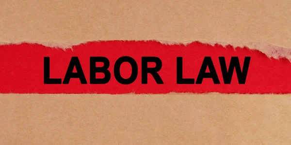 Law Concept Torn Sheets Paper Red Background Inscription Labor Law — стоковое фото