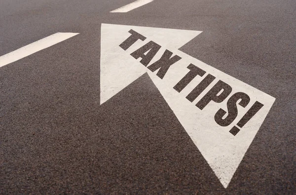 Markings and an arrow with the inscription - Tax Tips — Stockfoto