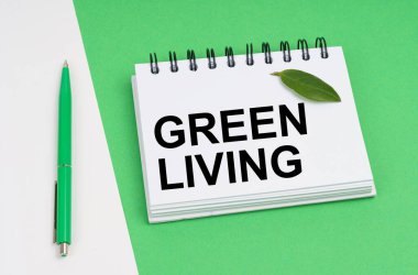 Ekolojik kavram. Beyaz-yeşil arka planda bir kalem ve üzerinde 