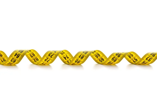 Curled spiral tape measure — Stock Photo, Image