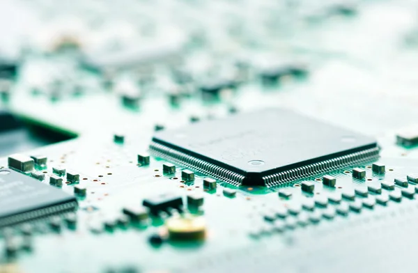 Computer chip and circuit board — Stock Photo, Image