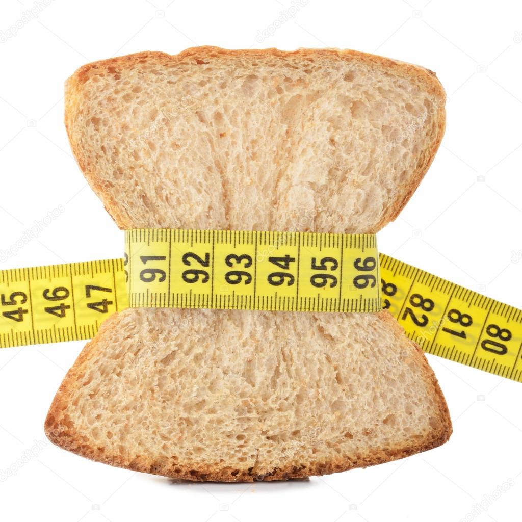Piece of bread grasped by measuring tape