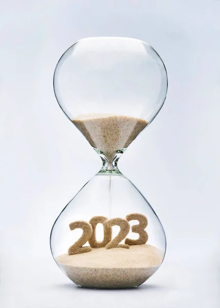 New Year 2023 Concept Hourglass Falling Sand Taking Shape 2023 Stockfoto